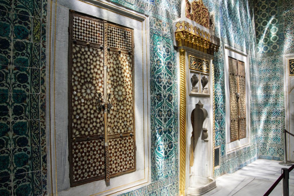 nlaid doors and mosaic tiles  in dappled shadows  in the Harem  in Topkapi Palace,  in Istanbul, Turkey