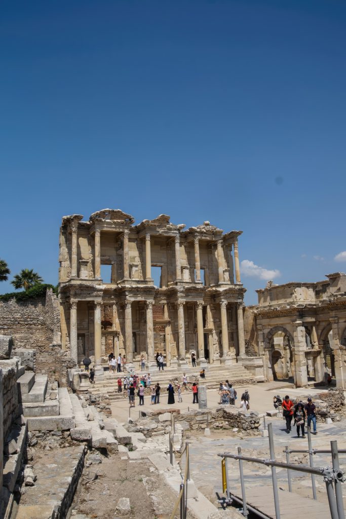 Tourists explore and photograph the Library of Celsus  Ephesus, Turkey